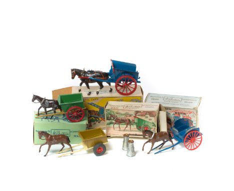 4 Britains Farm Series. Tumbrel Cart (4F). An example in blue with red wheels, yellow stays, with carter figure, no whip.  Pl