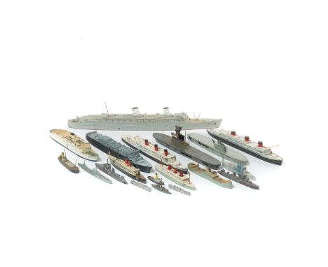 28 lead and die-cast waterline ships by various makes including some pre-war examples. Approx 1:1200 scale battle ships, tug 