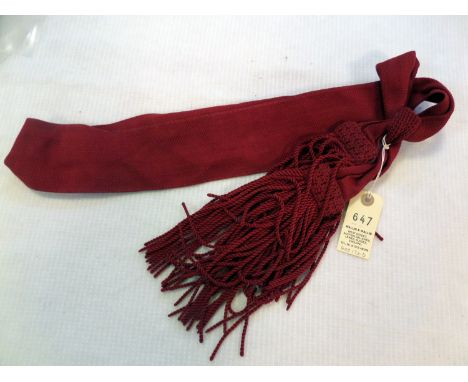 An officer’s scarlet 3” braid shoulder sash and tassels. GC                                                       