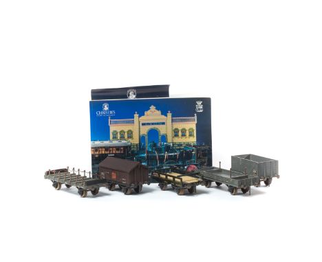 9 pre-war O gauge coarse scale freight wagons by Milbro (Mills Brothers). 4x flat wagons, an open wagon, 3x box vans and a bo