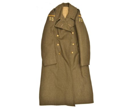 A scarce WWII OR’s khaki “Great coat 1939 pattern” of the 27th Bn Hampshire Home Guard, embroidered “Home Guard” shoulder tit