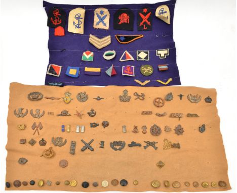 A group of mainly WWII Australian insignia, including cap badges of the RAAF and ASC, collar badges of 1st Light Horse Regt, 