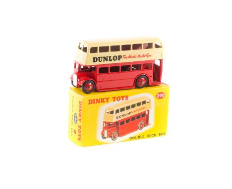 Dinky Toys Double Deck Bus (290). Example in cream and red, with 'DUNLOP The Master Tyre' adverts to sides, with red wheels a