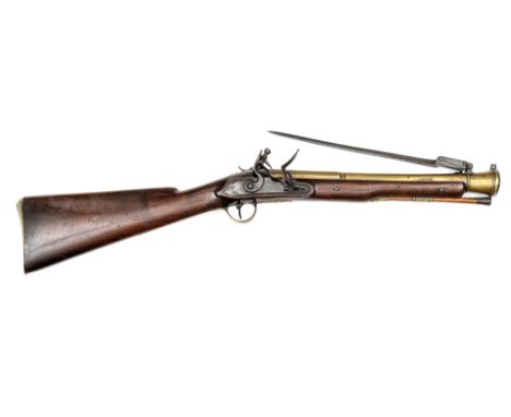 A late 18th century brass barrelled flintlock blunderbuss with spring bayonet, 30½” overall, 2 stage bell mouth barrel 14½”, 