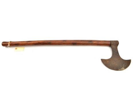 An early 19th century continental axe, crescent shaped blade 8¼”, stem with armourer’s anvil mark, and socket onto thick, bro