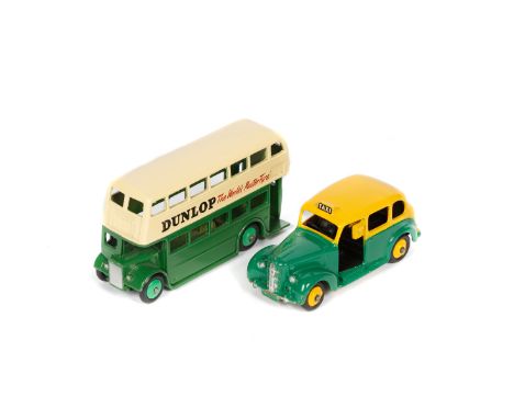 2 Dinky Toys public transport vehicles. A Leyland double deck bus (290), an example in green and cream with DUNLOP adverts, a