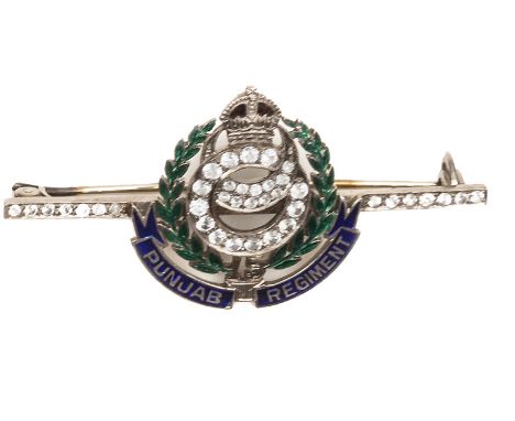A most attractive 18ct sweetheart brooch of the 15th Punjab Regiment. Based on the regimental cap badge of a chakram with int