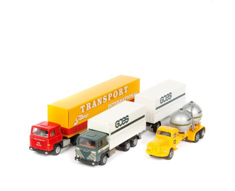 3 Dutch Tekno trucks. A Scania Vabis 76 normal control 3-axle rigid concrete truck.  Truck in bright yellow with 2 silver sph