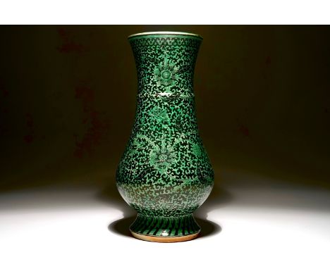 A rare Chinese verte-noire biscuit lotus scroll vase, Kangxi H.: 36 cm  Condition: (UV checked)- With a small filled 8 x 4 mm