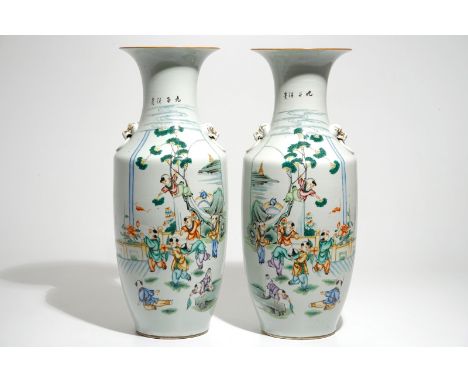 A pair of Chinese famille rose vases with playing boys, 19/20th C. H.: 57,5 cm