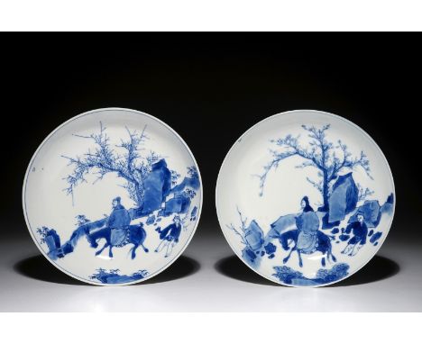 A pair of Chinese blue and white plates with a sage on a donkey, Kangxi mark and of the period Dia.: 15,5 cm