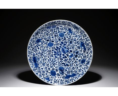 A large Chinese blue and white charger with floral design and powder blue back, Chengua mark, Kangxi Dia.: 40 cm - H.: 7 cm
