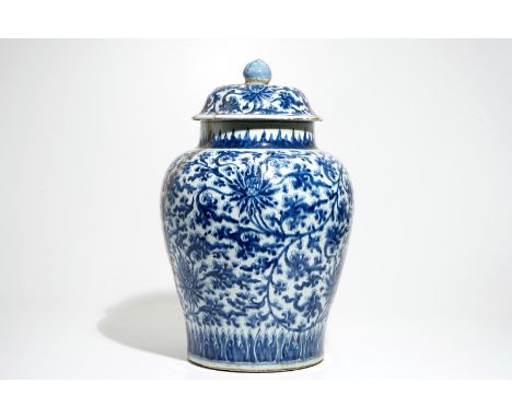 A large Chinese blue and white lotus scroll baluster vase and cover, Kangxi H.: 59,5 cm