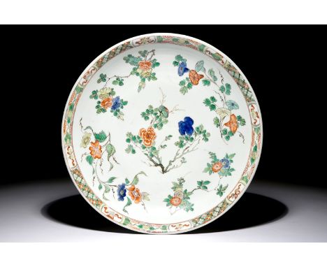A Chinese famille verte charger with flowering branches, Kangxi Dia.: 34 cm