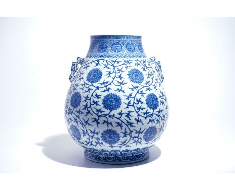 A Chinese blue and white lotus scroll hu vase, Qianlong mark, 20th C. H.: 47 cm