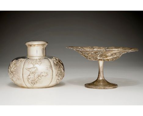A Chinese silver tea caddy and an openworked dragon tazza, 19/20th C. H.: 8 cm - Dia.: 14 cm (the caddy)  The tea caddy marke