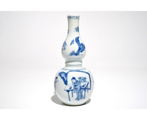 A Chinese blue and white double gourd vase, Kangxi H.: 23 cm