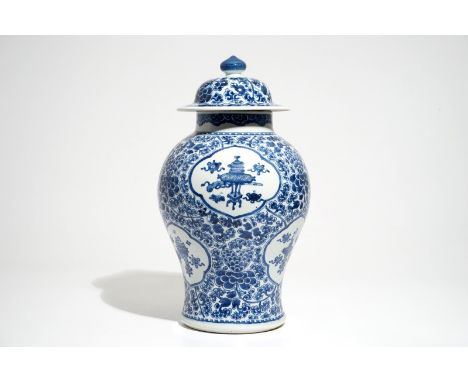 A Chinese blue and white baluster vase and cover, Kangxi H.: 44,5 cm