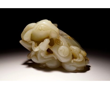 A Chinese white jade carving of a "Three rams" group, 19/20th C. H.: 6 cm - L.: 11 cm