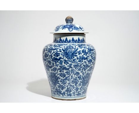 A large Chinese blue and white lotus scroll baluster vase and cover, Kangxi H.: 51 cm