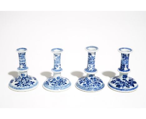 Four small Chinese blue and white floral candlesticks, Kangxi H.: 7,5 cm