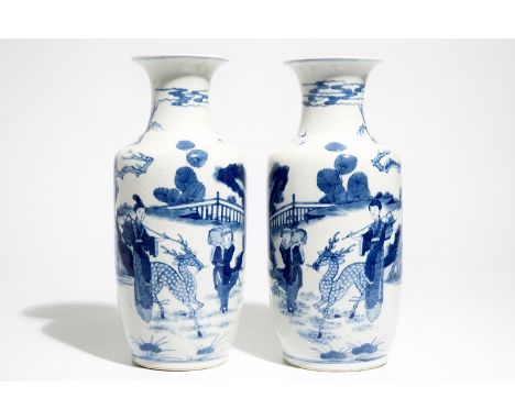 A pair of Chinese blue and white rouleau vases, Kangxi mark, 19/20th C. H.: 35,5 cm