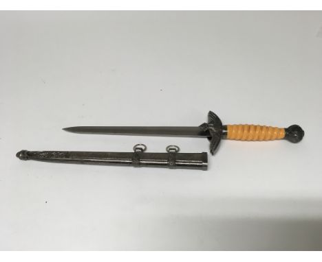 Another reproduction WW2 German nazi dagger with scabbard.