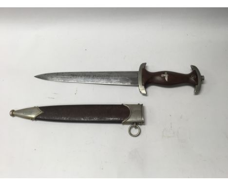 A German WW2 SA etched Rohm dagger, bearing Eickhorn marks with worn scabbard.