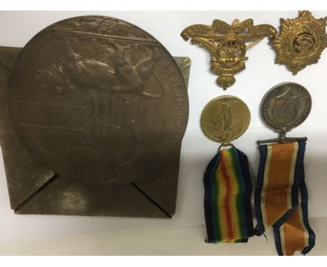 A First World War memorial plaque Cyril Vivian Dimon and two first world war medals awarded to his brother 24275 Pte E.S Dimo