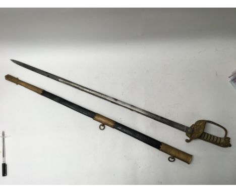 A 19th century officers naval sword with leather scabbard.