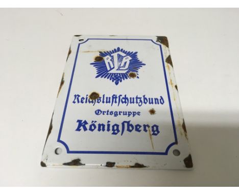 A small German WW2 Reichsluftschutzbund enamel plaque, for air raid precautions. Size approx 17cm by 12cm.