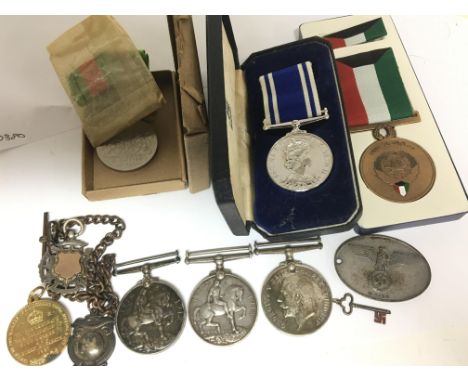 Three l World war medals awarded to 15995.PTE G DYKES R.W KENT.R. 13436 PTE.W.CUTMORE.ESSEX.R and 2.LIEUT G.M.LOWCOCK. other 