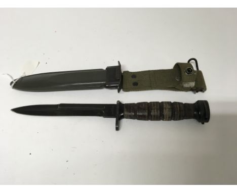 A USA bayonet by S.A.B Ridgefield, made in Japan with an M8 scabbard.