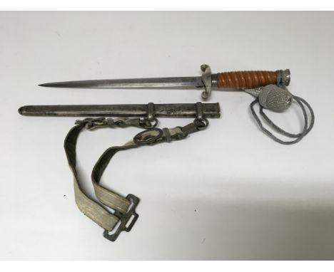 A German army officers dagger with Puma solingen makers mark. Reproduction composite grip. Knot and hangers. A/F.