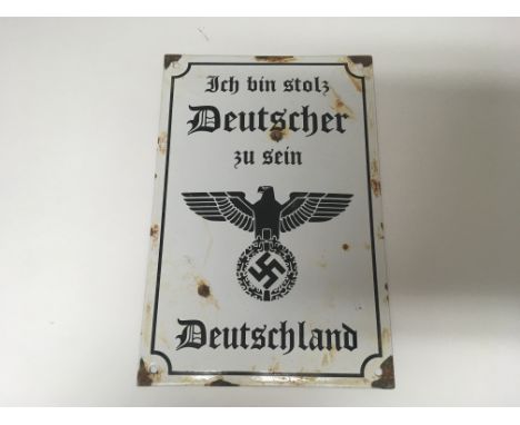 A German WW2 enamel plaque, roughly translating to a message about being proud to be German. Size approx 20cm by 30cm.