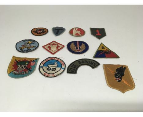 A Vietnam War Style group of 12 US Army patches.