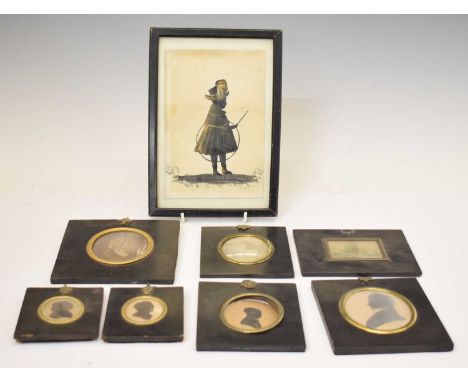 Four 19th century portrait silhouettes of a gentleman and three children, all in ebonised frames gilt metal suspension rings,