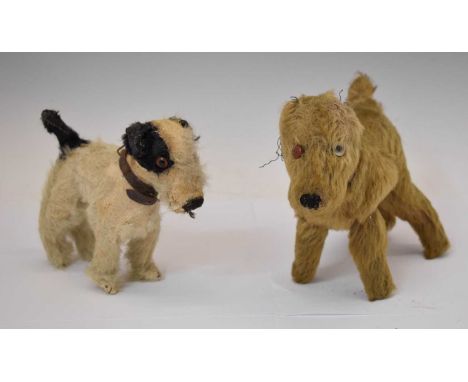 Two early 20th century mohair dogs, possibly by Farnell, each with glass eyes, black stitched nose and mouth, and studded lea