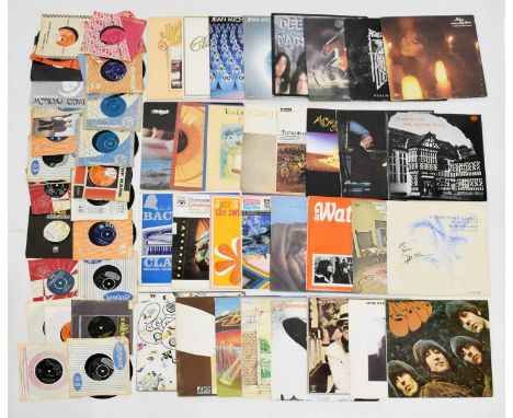 Large quantity of 45 and 33 RPM vinyl records to include, Led Zepplin, The Beatles, Boston, Elton John, classical records, et