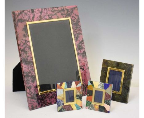Small pair of hardstone picture frames, together with a large pink and black hardstone frame and one other, 34.5cm x 37.5cm a