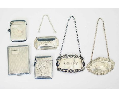 Two silver vesta cases (Birmingham 1900 &amp; 1915), a George V silver matchbox holder, Birmingham 1929, and three Elizabeth 