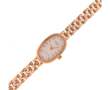 Rotary - Lady's 9ct gold bracelet watch, the white dial with applied gilt baton hour markers, and gilt hands, quartz movement