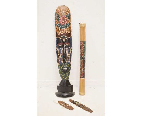 Ethnographica - Australian Aboriginal style bust, 101cm high, a rainstick, 81cm long, and two bullroarers, one inscribed vers