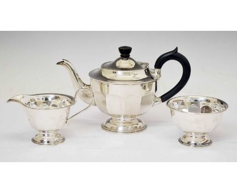 George VI silver three-piece tea set comprising teapot, sugar bowl, and milk jug, sponsor's mark of Viners, Sheffield 1937, 1