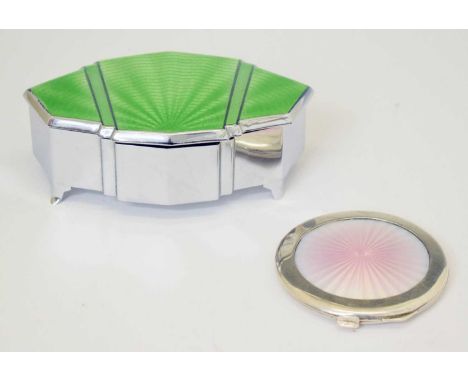 George V silver and enamel compact, of hinged circular form with pale pink radial engine turned decoration, Birmingham, 1932,