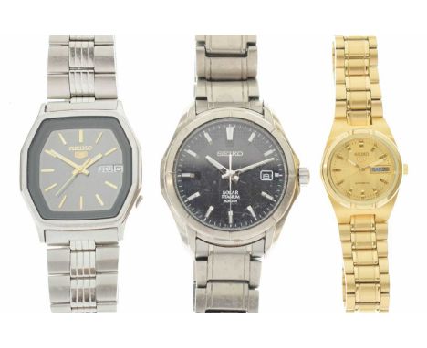 Seiko - Group of bracelet watches comprising; 'Solar Titanium 100M', with black dial, and date aperture, quartz movement, '5'
