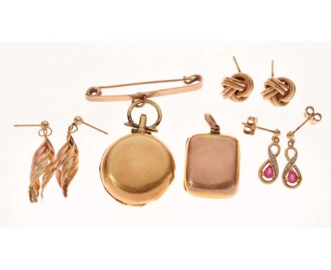 Early 20th century rectangular locket stamped '15ct', a '9ct' bar brooch with suspended plated family portrait locket fob, an