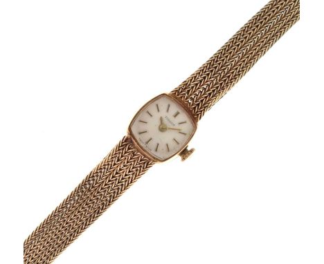Tissot - Lady's 9ct gold bracelet watch, the silvered dial with applied gilt baton hour markers, and gilt hands, snap-on case