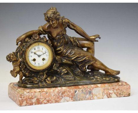 Late 19th century French spelter figural mantel clock depicting a maiden and cherub, the white Arabic dial with floral decora