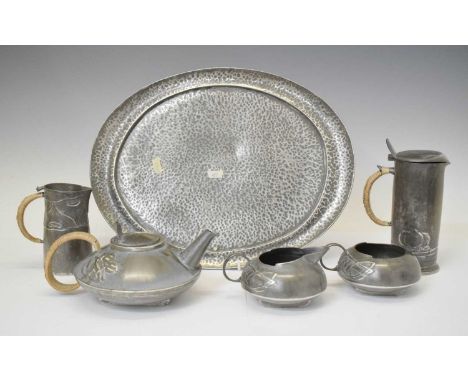 English Pewter four piece tea set with lidded tankard, after a design by Archibald Knox for Tudric Pewter, together with two 